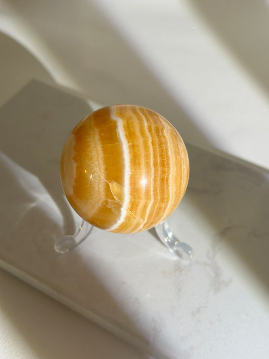 Orangencalcit Kugel 26V